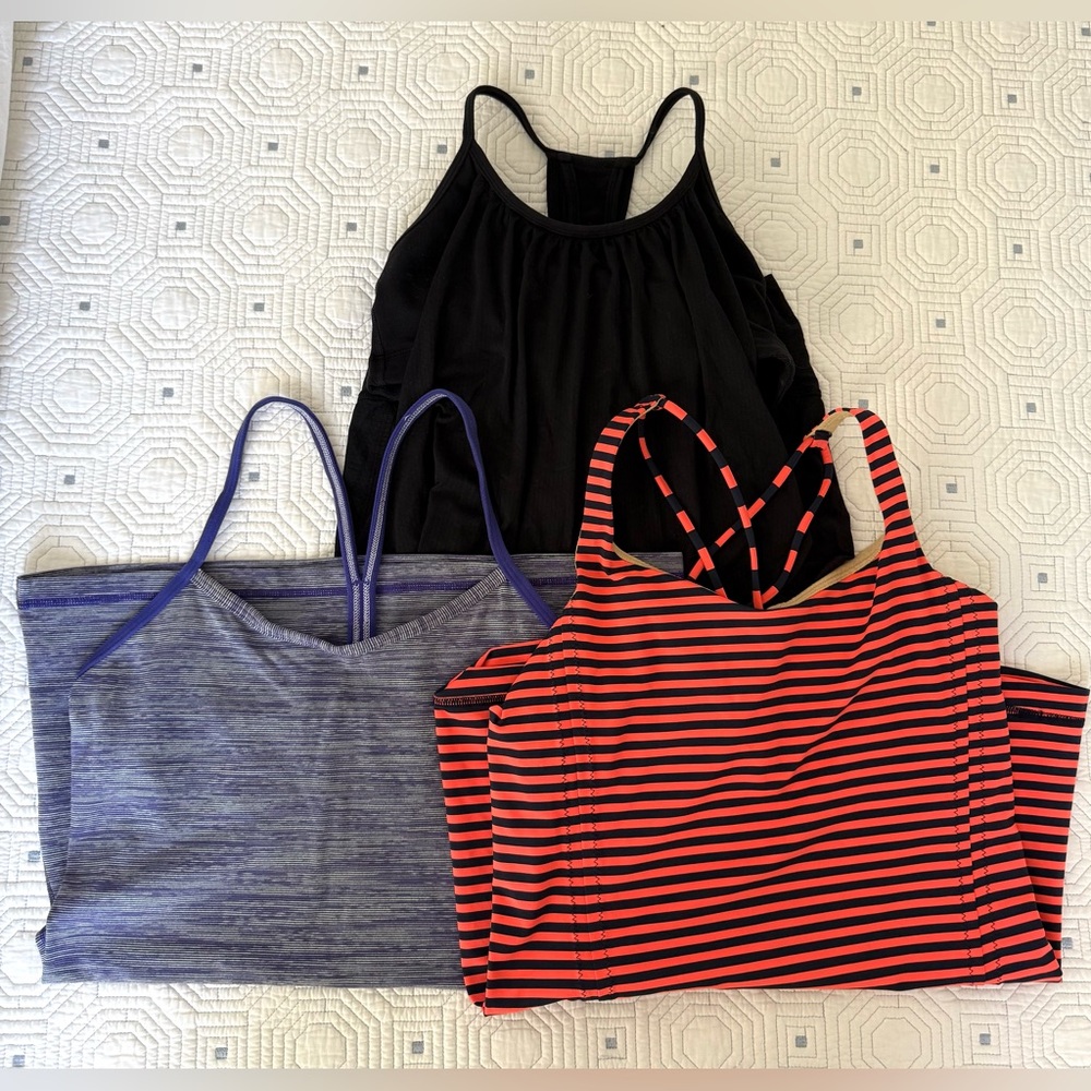 3 Lululemon tank tops: black, purple and grey, black & orange  no tags, size 6